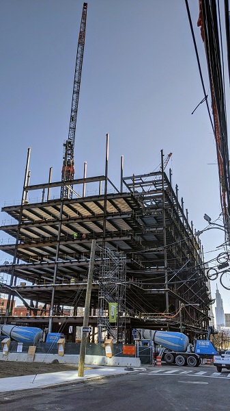 Cement trucks ready to start pouring concrete floors of the new building.
